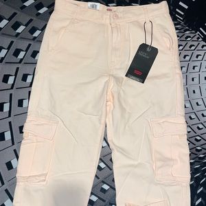 LEVI’S cargo pants! BRAND NEW W/TAGS. Color: peach. Size: 26x28 in women’s.